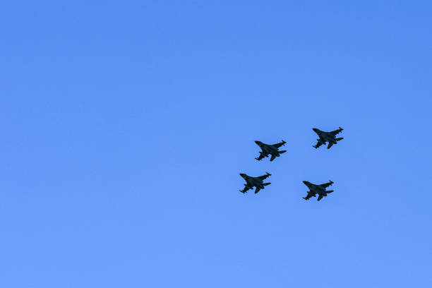 istock US Supersonic Multirole Fighter Aircraft Flying in Formation 1080159724