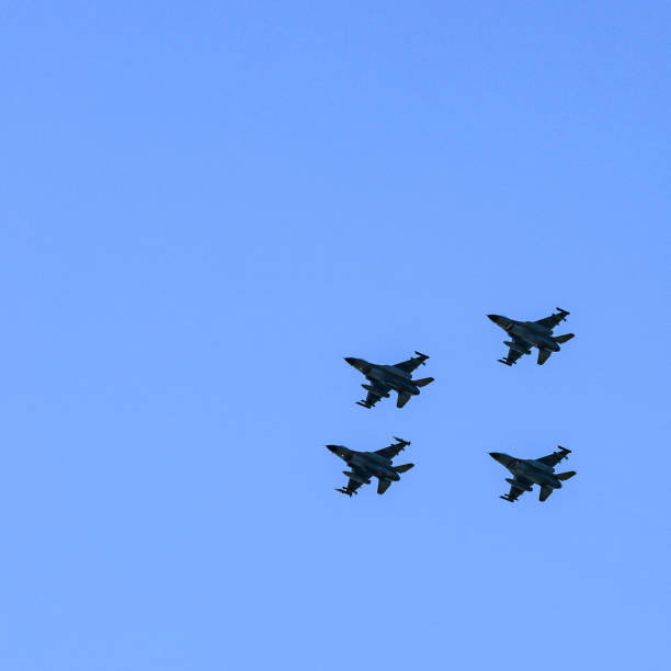 istock US Supersonic Multirole Fighter Aircraft Flying in Formation 1080159758