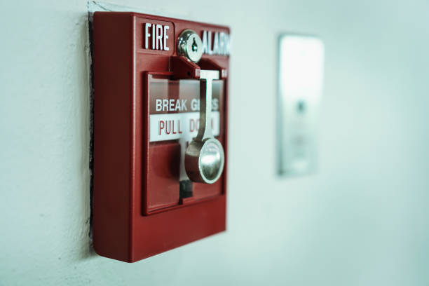 istock Manual fire alarm box at cement wall in the building.selective focus. 1080163328