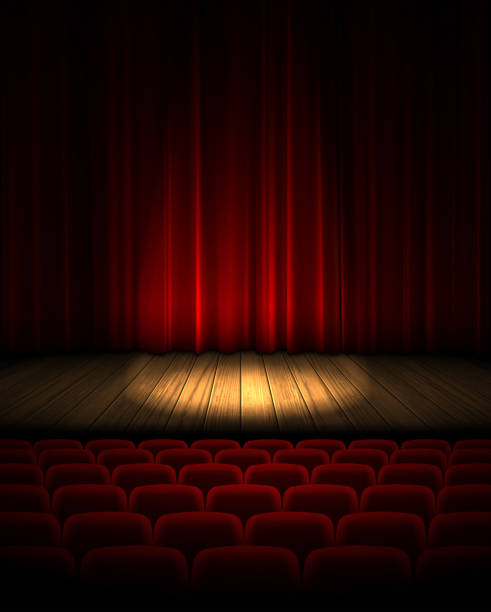 istock Illuminated theater stage with a red curtain.  Highly realistic illustration. 1080163530