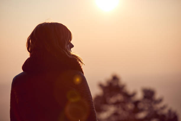 istock Lonely woman watching distant nature landscape. 1080166680