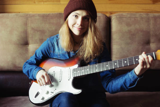istock Teenager playing guitar. 1080167228