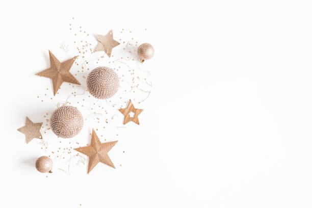 istock Christmas composition. Christmas golden decorations on white background. Flat lay, top view, copy space 1080167464