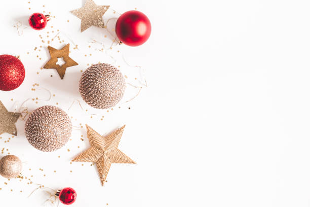 istock Christmas composition. Christmas red and golden decorations on white background. Flat lay, top view, copy space 1080167482