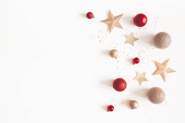 istock Christmas composition. Christmas red and golden decorations on white background. Flat lay, top view, copy space 1080168144