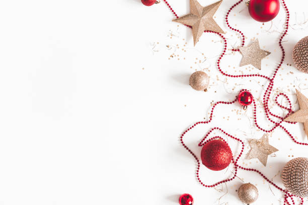istock Christmas composition. Christmas red and golden decorations on white background. Flat lay, top view, copy space 1080168464