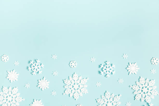 istock Christmas or winter composition. Pattern made of snowflakes on pastel blue background. Christmas, winter, new year concept. Flat lay, top view, copy space 1080170558