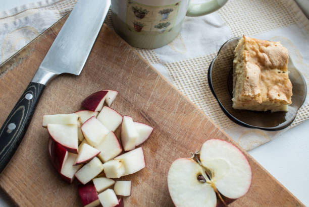 istock a apple pie knife and tea on a white background 1080170620
