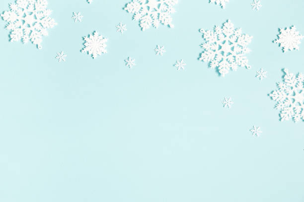 istock Christmas or winter composition. Pattern made of snowflakes on pastel blue background. Christmas, winter, new year concept. Flat lay, top view, copy space 1080170710