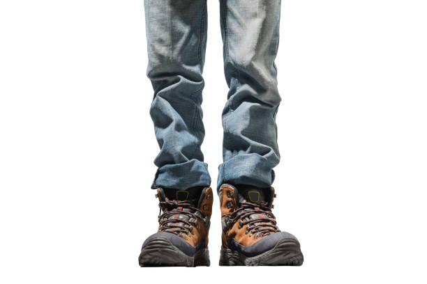 istock Man in jeans wearing trekking boots 1080171718