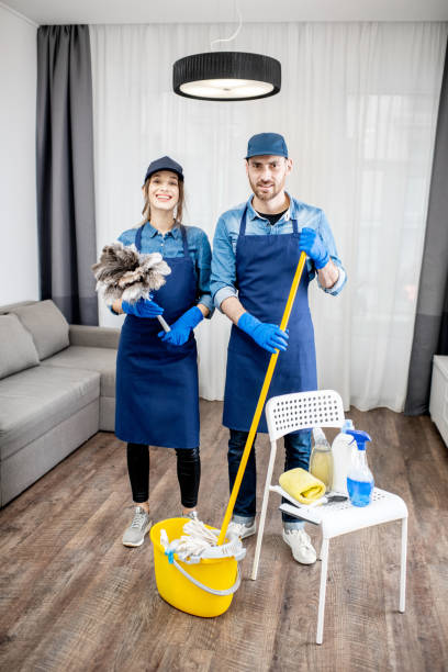 istock Professional cleaners with cleaning tools indoors 1080175198