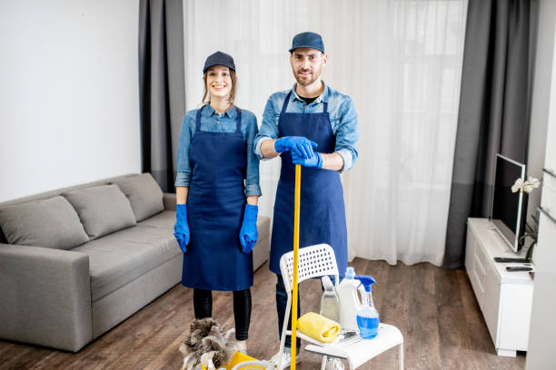istock Professional cleaners with cleaning tools indoors 1080175220