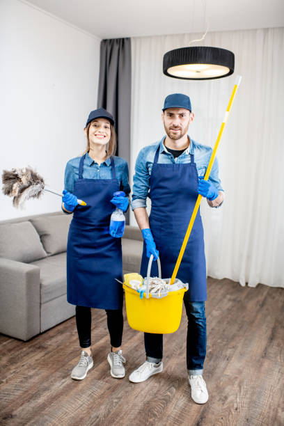 istock Professional cleaners with cleaning tools indoors 1080175222