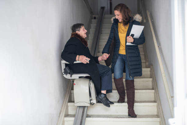 istock Old woman moving down the stairs 1080175360