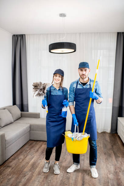 istock Professional cleaners with cleaning tools indoors 1080175364