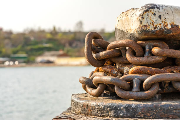 istock rusty anchor chain around the bollard 1080175714