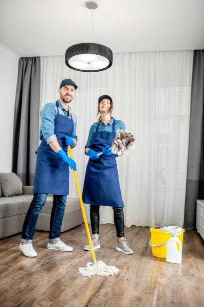 istock Professional cleaners with cleaning tools indoors 1080175752
