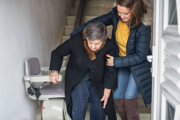 istock Old woman moving down the stairs 1080175970