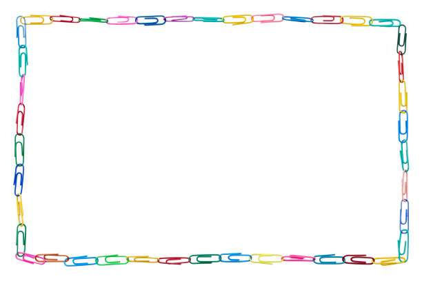 istock Colorful frame made of paper clips on white background 1080180682