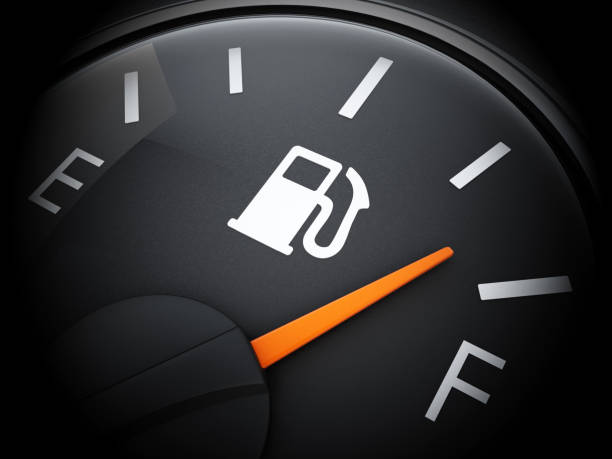 Fuel gauge with needle on E indicating empty car tank Fuel gauge with needle on E indicating empty car tank diesel fuel photos stock pictures, royalty-free photos & images