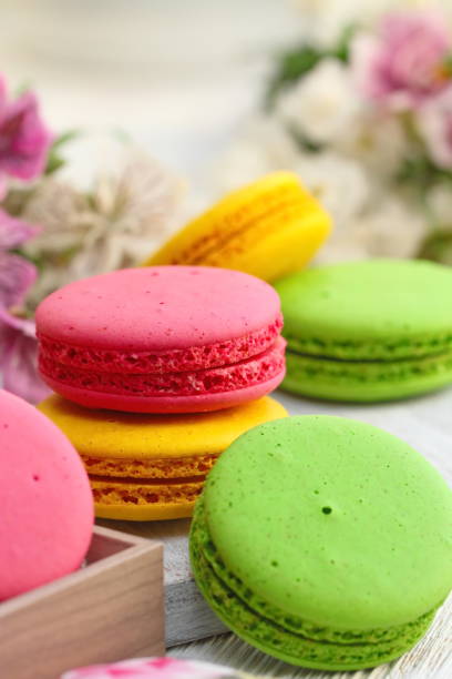 istock Colorful macaroons on wooden table. Sweet dessert 1080195068