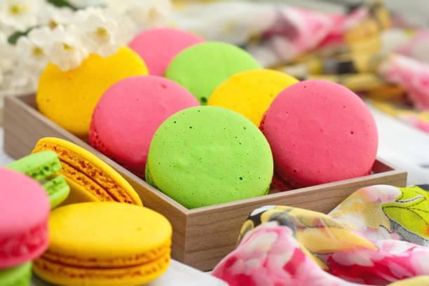 istock Colorful macaroons on wooden table. Sweet dessert 1080195070