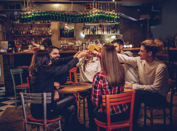 istock Friends having a toast in pub 1080202550