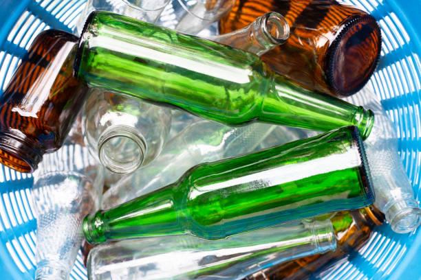 istock Glass bottles in waste basket. 1080206936
