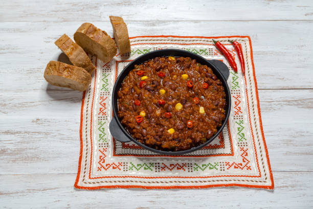 istock Mexican chili con carne on  wooden background. 1080207456