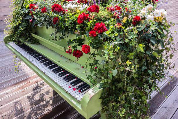 istock Piano covered with flowers 1080208528