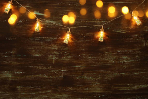 istock image of Christmas tree in the masson jar garland light. 1080210874
