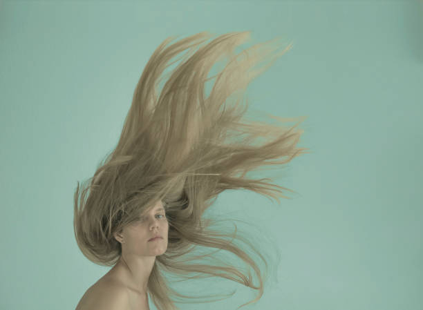 istock Young women with flying hair 1080214742