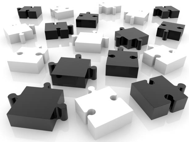 istock Scattered black and white puzzle pieces 1080215142