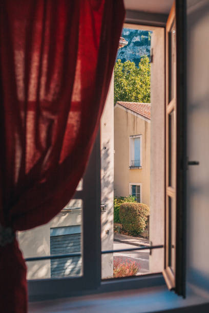 istock View through the open window onto the streets in Fontaine-de-Vaucluse 1080219014