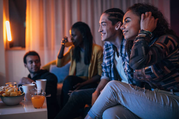 istock Friends watching a movie at home 1080219148