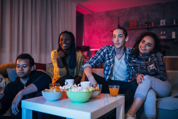 istock Friends watching a movie at home 1080219268