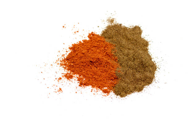 istock Red ground paprika and black pepper isolated on white background 1080220362