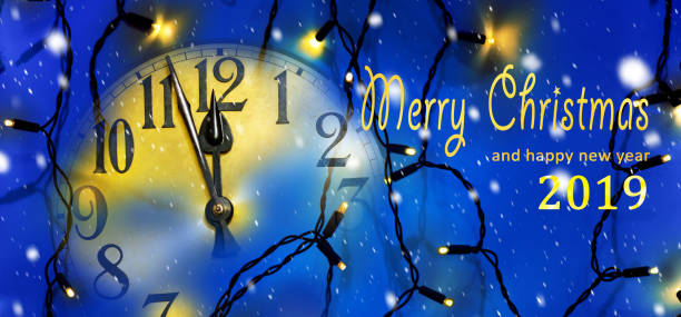 istock Clock face and Christmas electric light before midnight 1080220412