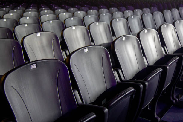 istock Empty comfortable chairs seats with numbers in hall 1080220550