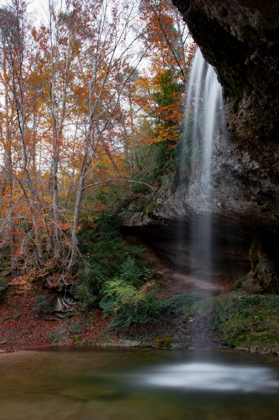istock Font del Bisbe autumn waterfall 1080223516