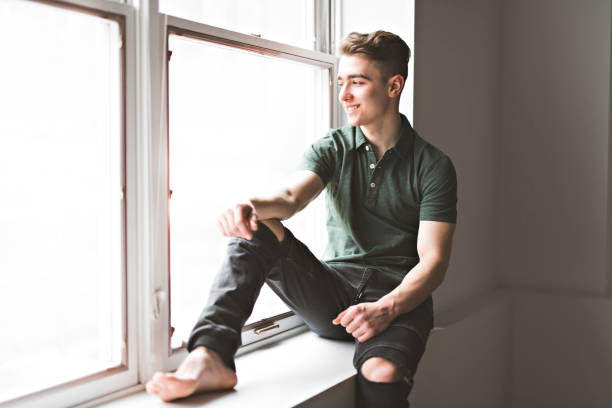 istock Man sit ont close to the window 1080229182