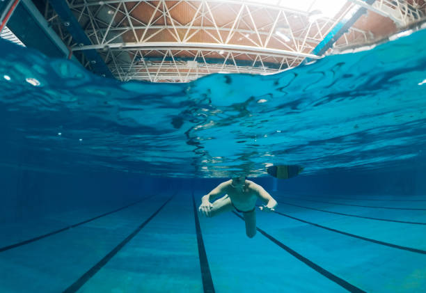 istock Swimming in swimming pool 1080230272