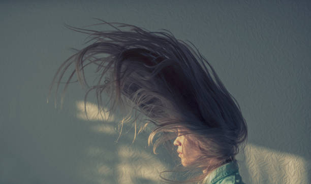 istock Young women with flying hair 1080230590