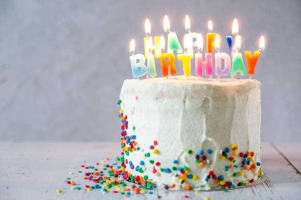 istock Colorful birthday concept - cake, candles, presents, decorations 1080233066