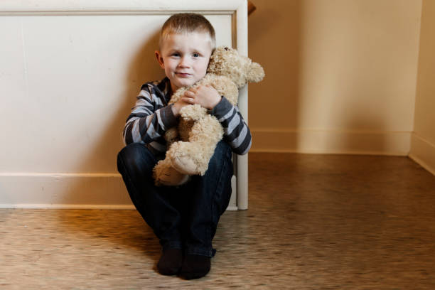 istock Upset problem child close to the staircase concept for bullying, depression stress 1080240526