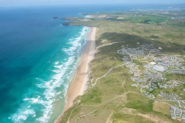 Aerial Views along Perranporth Beach, Newquay, Cornwall on a sunny June day.