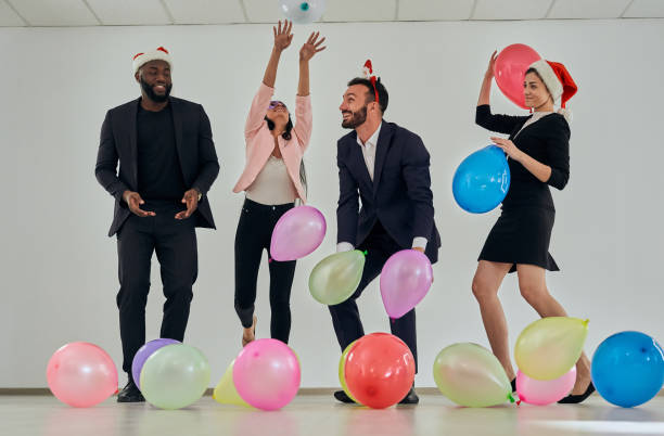 istock The happy business people playing with baloons 1080255388