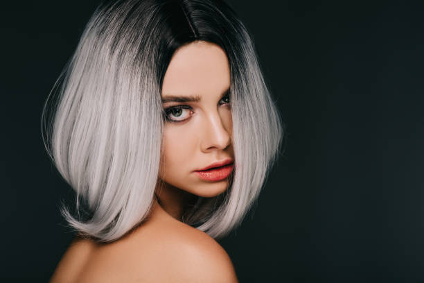 istock beautiful sensual model posing in grey wig, isolated on black 1080256202