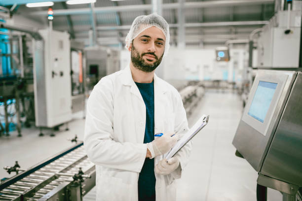 istock Bearded Male Lab Technician Posing In a Laboratory 1080265758