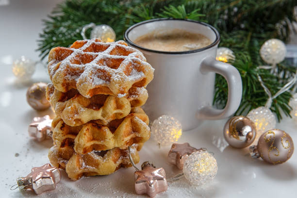 Christmas background.Breakfast waffles with coffee.